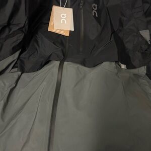 On Running Charcoal and Light Gray Jacket